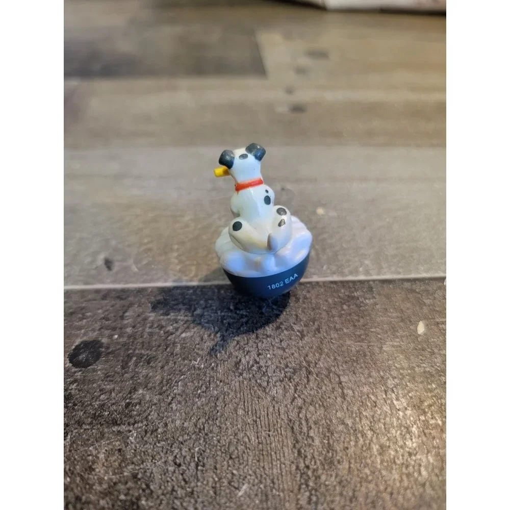 Dalmatian dog‎ with hose wobbling toy figure